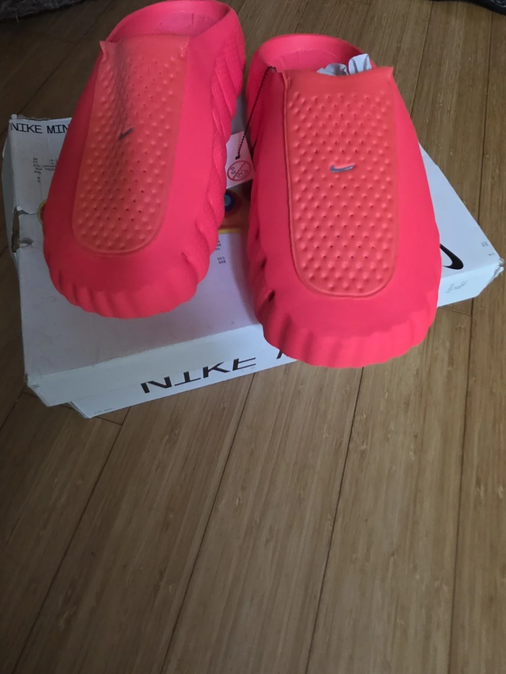 Nike Neon Pink Slip-On Athletic Shoes with Silver Swoosh